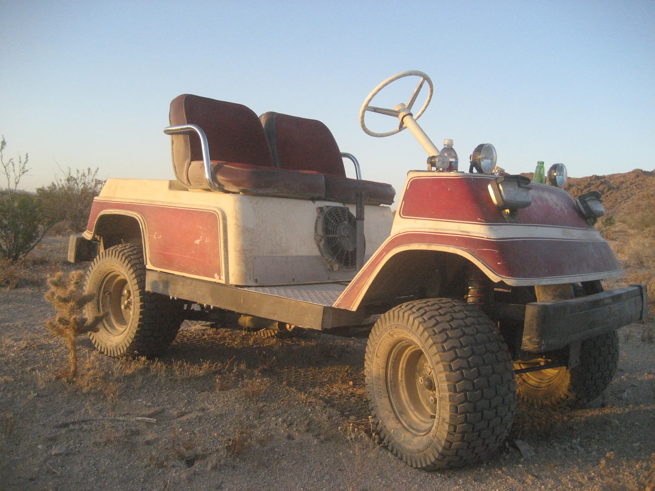A petrol-engined golf cart built for rough duty