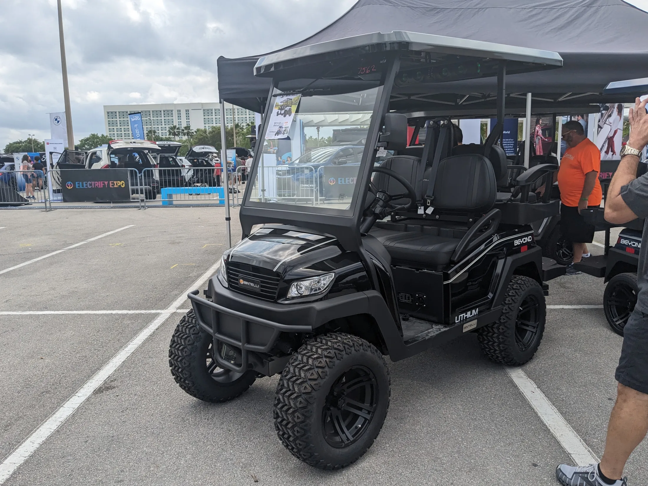 A lithium golf cart with its LITHIUM badge visible on the front nose panel